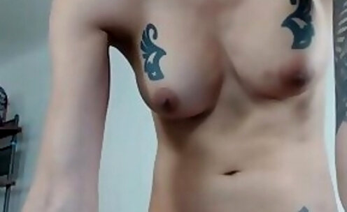 tattooed brunette teen shemale teasing on webcam