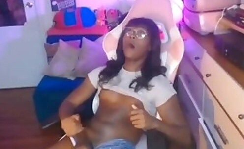glassesed black trans babe with sexy feet legs and big