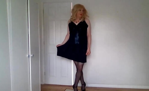 Stripping naked out of a black dress and pantyhose