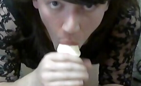 Jenn On Her Knees With a Cock in Her Mouth